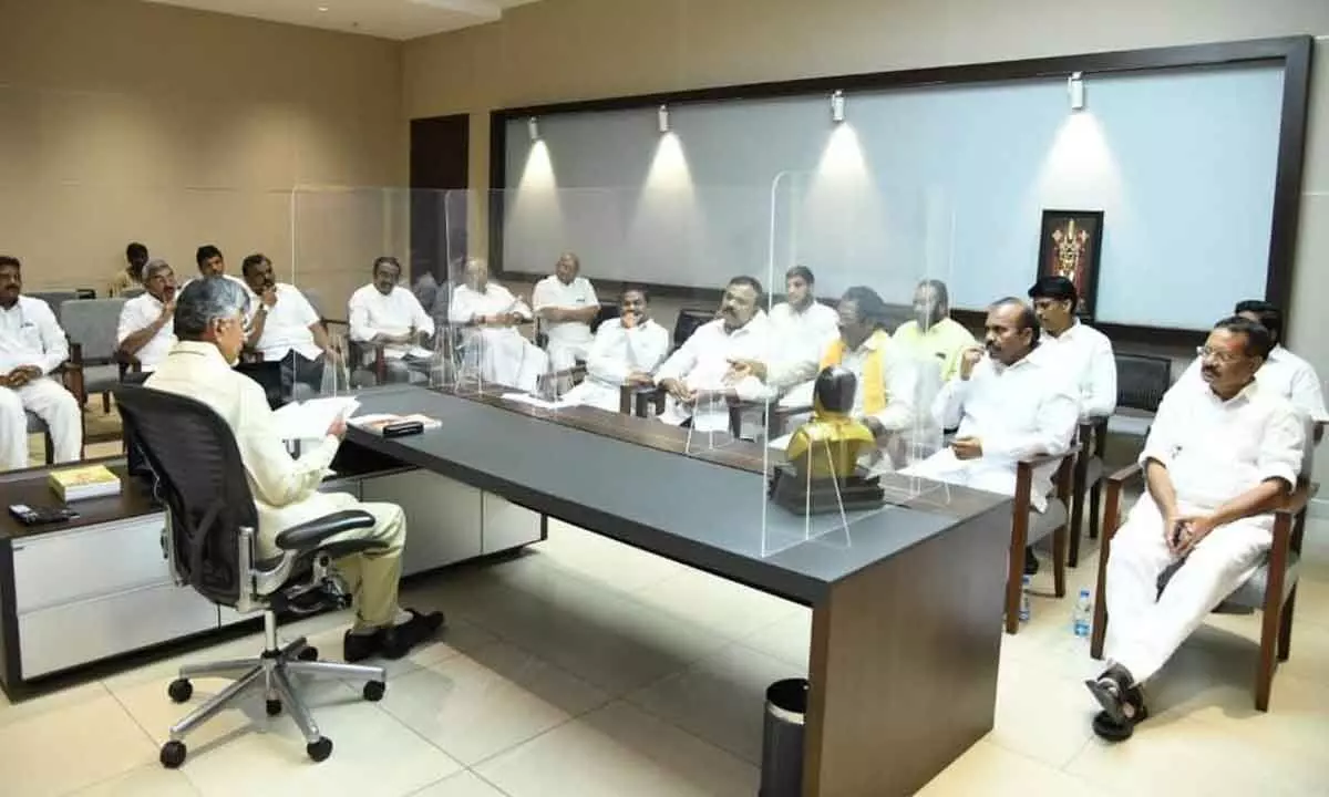 TDP national president N Chandrababu Naidu addressing erstwhile Guntur district leaders’ meeting at the party State office in Mangalagiri on Friday