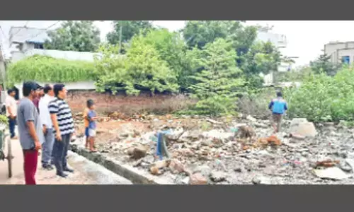 KMC Additional Commissioner Ch Naga Narasimha Rao inspecting Godarigunta area in Kakinada on Friday