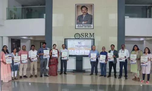 SRM University-AP Vice-Chancellor releasing Elon fellowship poster on the varsity premises at Neerukonda on Friday