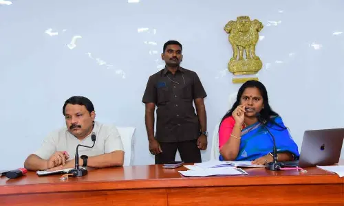 District Collector Vijaya Krishnan addressing a review meeting in Bapatla on Friday. Joint Collector Dr K Srinivasulu is also seen.