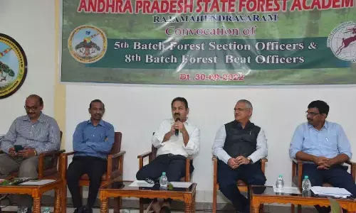 PCCF Y Madhusudhan Reddy speaking at the convocation ceremony at AP State Forest Academy in Rajamahendravaram on Friday