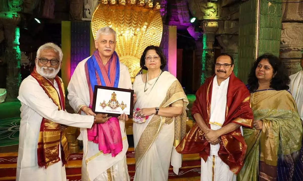 TTD Chairman Y V Subba Reddy presenting a portrait of Lord Venkateswara to Chief Justice of India Justice Uday Umesh Lalit at Tirumala on Sunday. Chief Justice of AP High Court Justice Prashant Kumar Mishra is also seen.