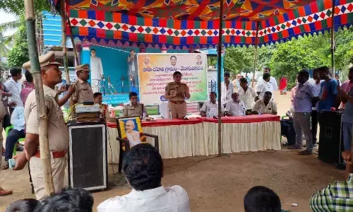 Special Enforcement Bureau Joint Director A Ramadevi addressing the villagers at a meeting in Venkatanagaram on Sunday