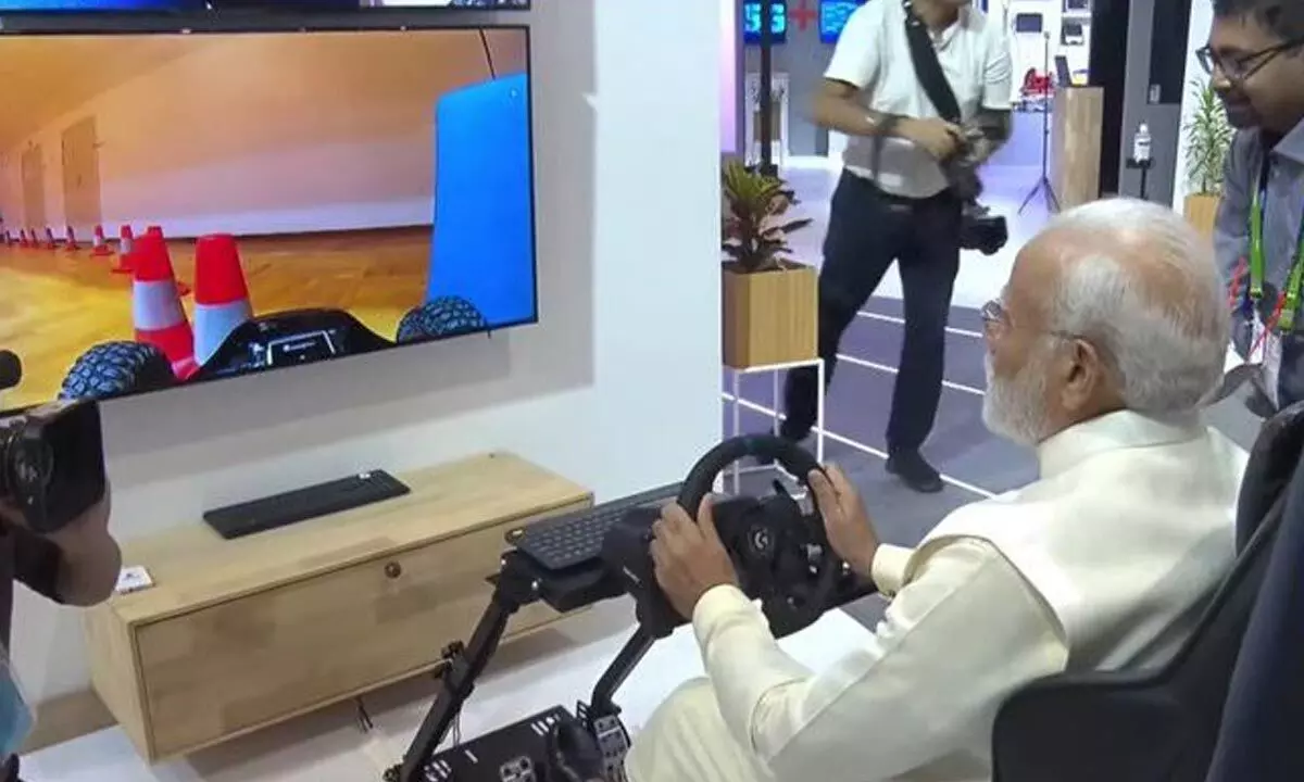 PM Modi Tests Drive a Car Remotely from Delhi in Europe using India’s 5G Technology