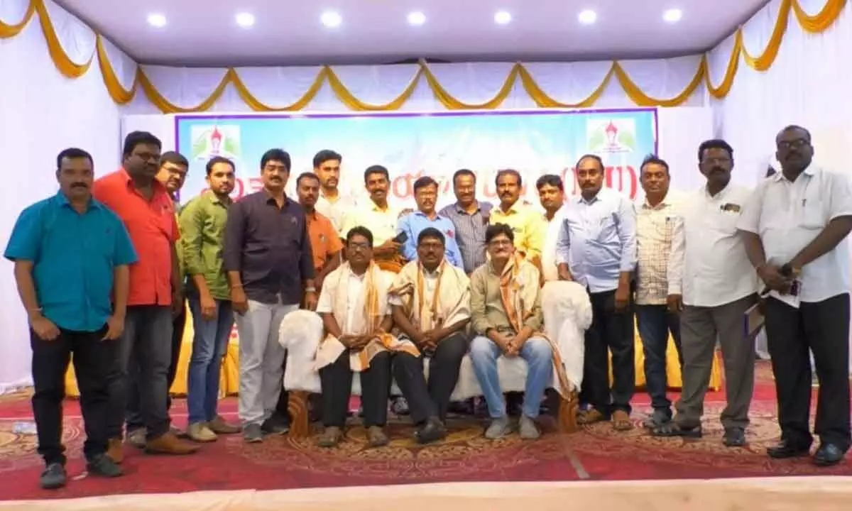 TUWJ (IJU) leaders felicitating senior scribes in Khammam on Monday