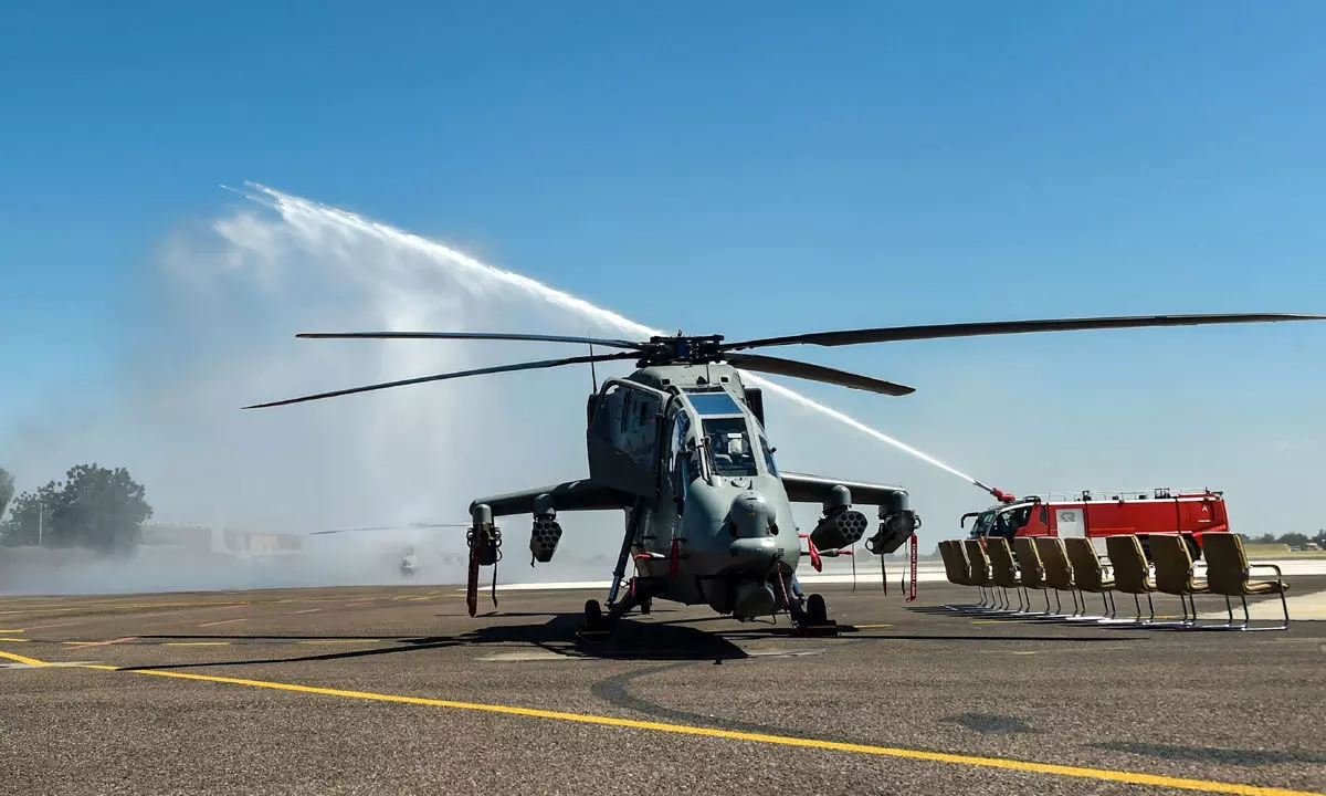 Water cannon salute being given to Prachand, an indigenously built Light Combat Helicopter, during its formal induction into the Indian Air Force, in Jodhpur on Monday