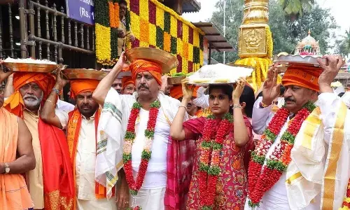 Endowments Minister offers silk clothes to presiding deities