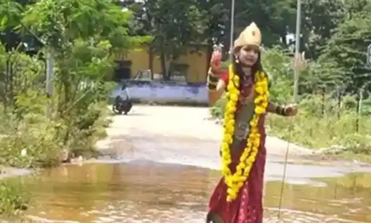 Harshita dressed up as Goddess Durga, in Hubballi.