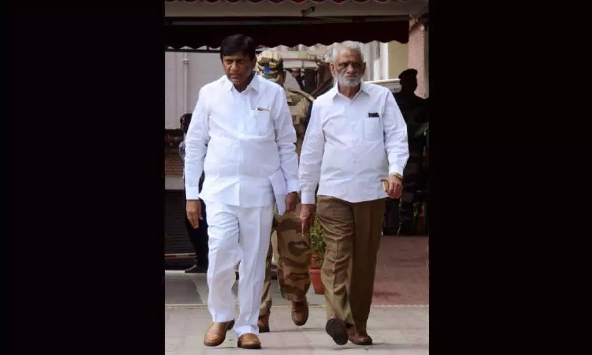 TRS leader Vinod Kumar and Party MLC Srinivas Reddy coming out of Nirvachan Sadan after meeting the Election Commissioner in New Delhi on Thursday