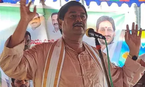 Revenue Minister Dharmana Prasada Rao speaking at felicitation function for nominated AMC members in Srikakulam on Friday