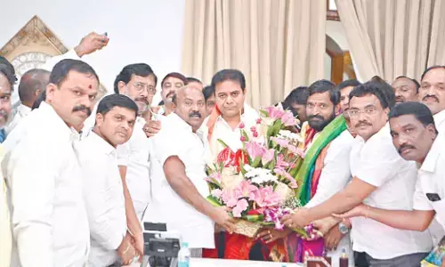 Leaders of Goud community meet TRS working president KT Rama Rao pledging their support to TRS candidate in the Munugodu bypoll, in Hyderabad on Saturday