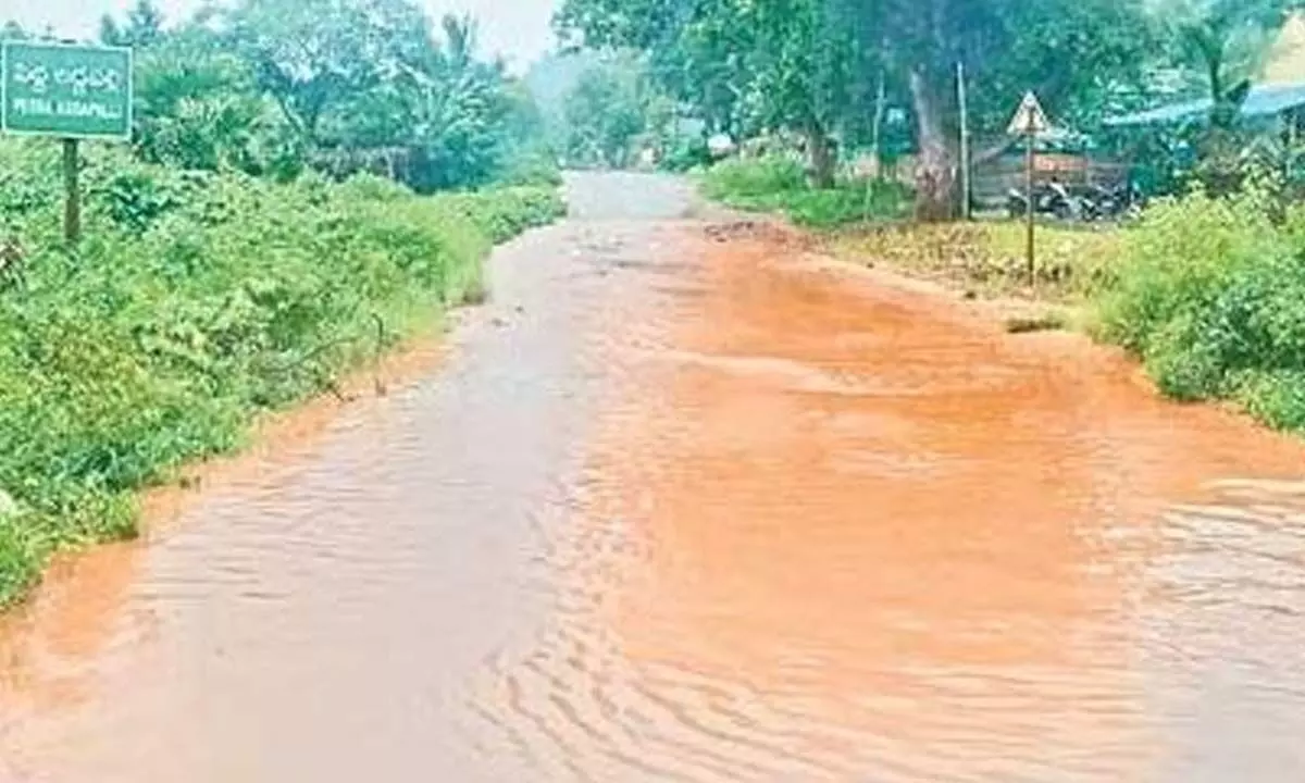 National highway turned into a stream near Pedda Addapali village of Gangavaram mandal