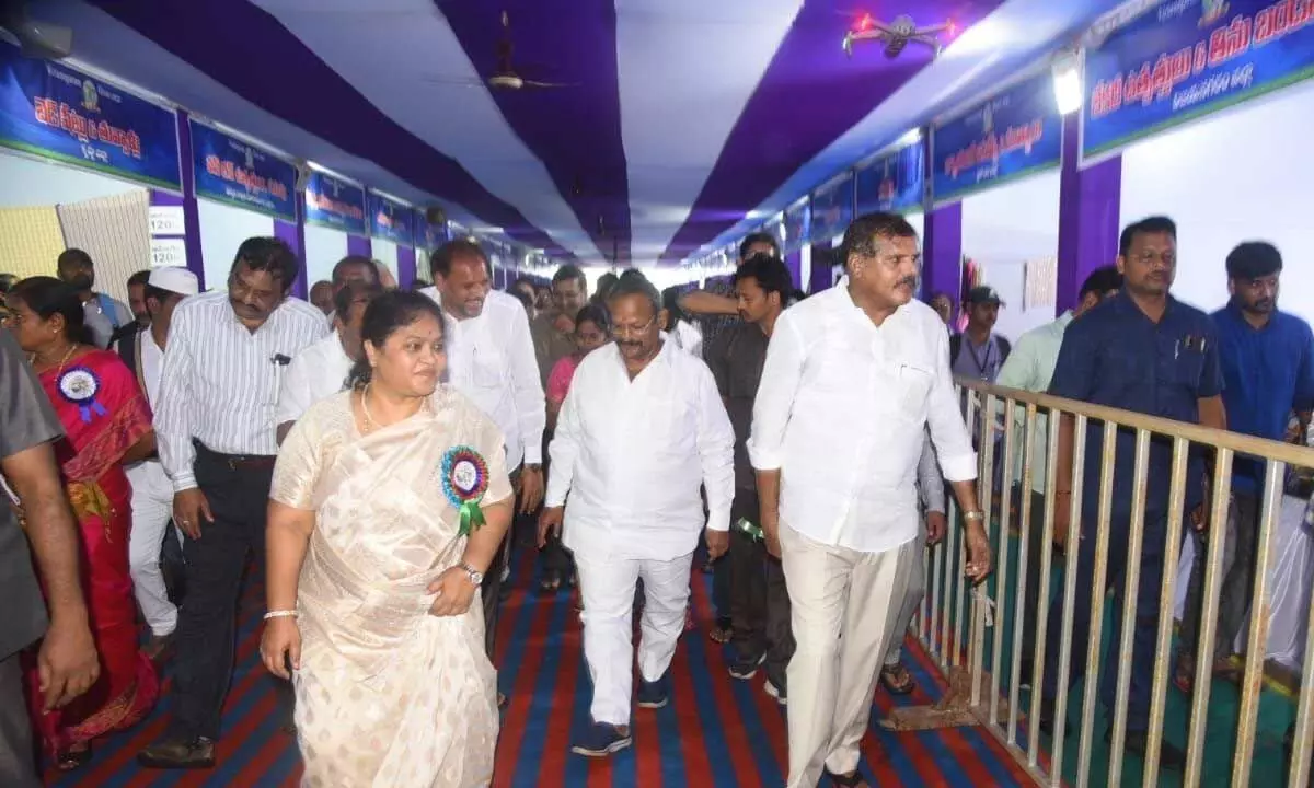 Minister Botcha Satyanarayana, Collector A Suryakumari and Assembly Deputy Speaker K Veerabhadra Swamy visiting stalls in Ayodhya Maidan in Vizianagaram on Sunday