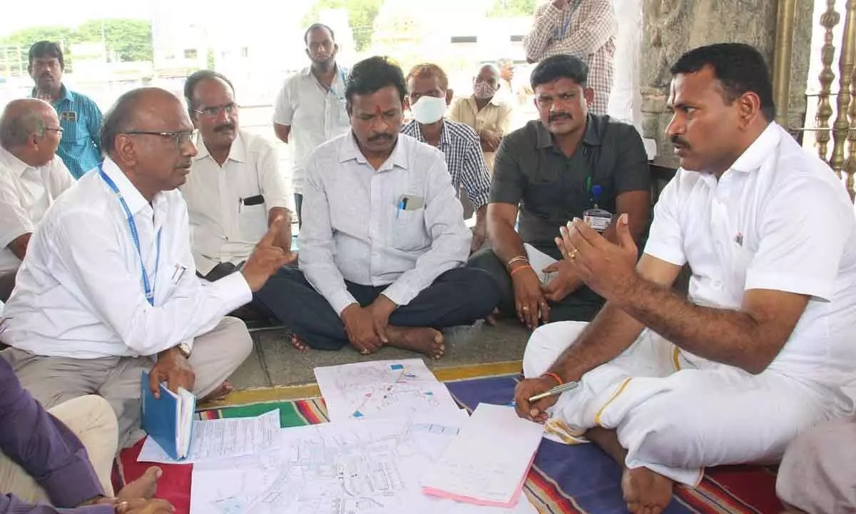 TTD JEO Veerabrahmam holding discussions with the officials on the Brahmotsavams arrangements to be held in November at Tiruchanur temple on Monday.
