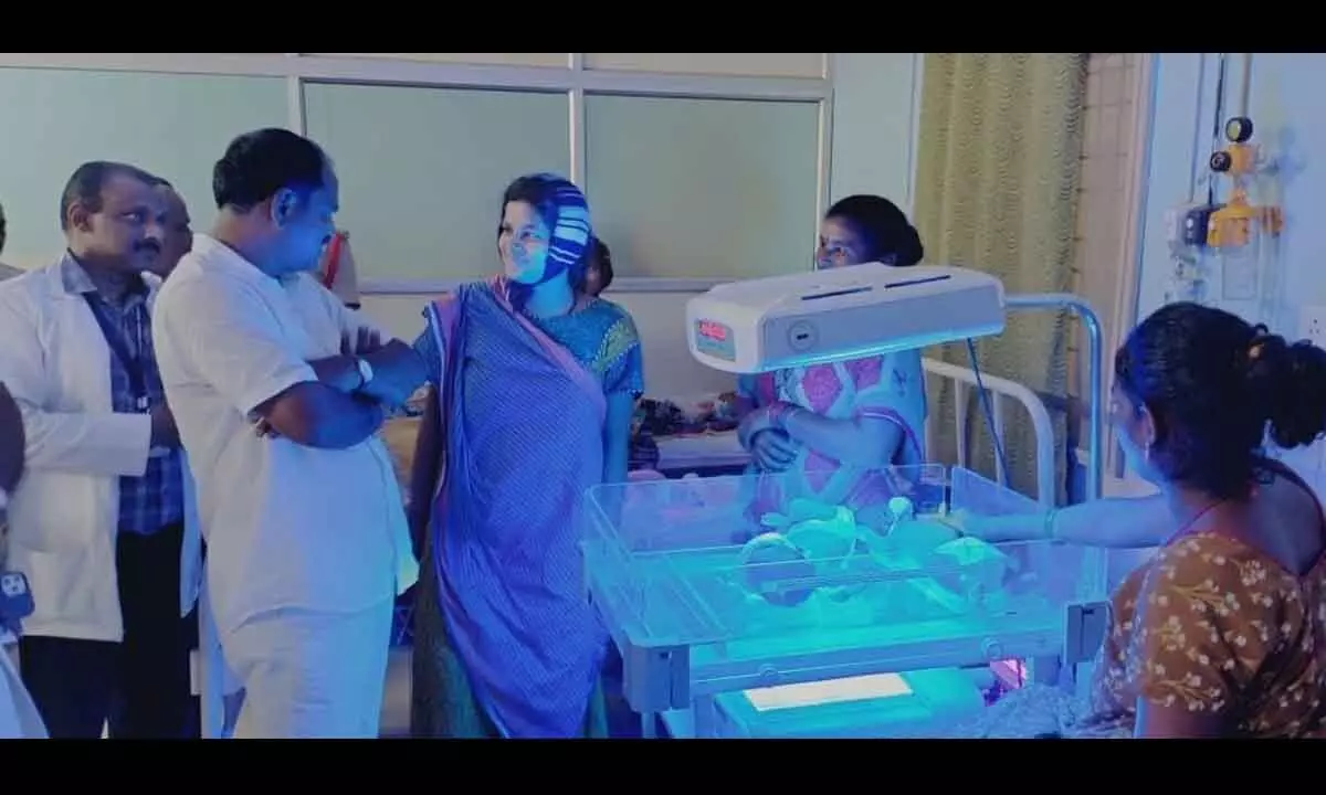 Deputy Chief Minister B Mutyala Naidu interacting with a patient in the hospital in Anakapalli district on Monday