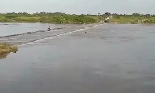 Three of family washed away in flooded bridge at Wanaparthy