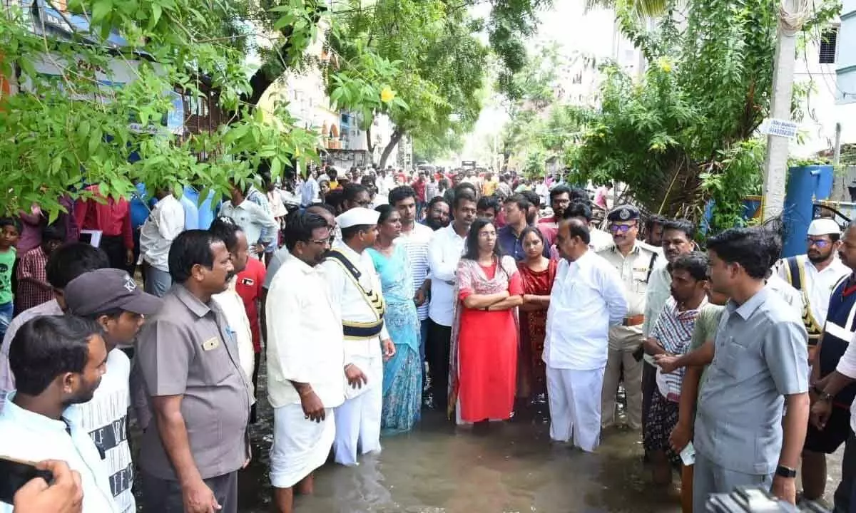 District Collector Nagalakshmi Selvarajan and MLA Anantha Venkatrama Reddy visiting rain-hit Rangaswamy Nagar residential colony in Anantapur on Wednesday