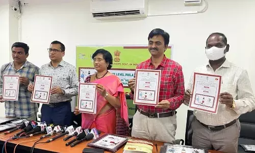 Director of Postal Services Aditya Kumar Nayak, Assistant Director (Philately) GV Balasaraswathi, Asst Postmaster General G Sivanagaraju, Assistant Director (Mails) Y Ramakrishna and Assistant Director (Admin) G Hariprasad releasing the prospectus of the philately exhibition APPEX-2022 in Vijayawada on Wednesday