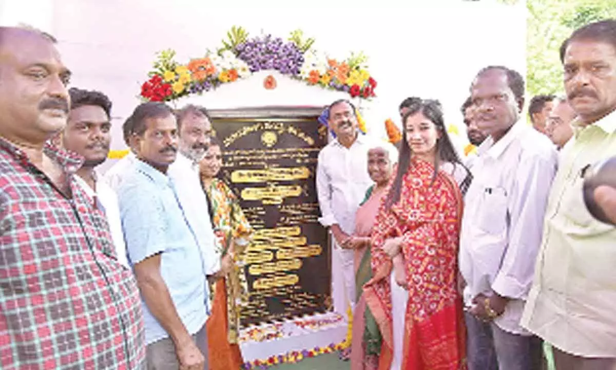 MLA Bhumana inaugurating the CC road and CC drain in 20th division in Tirupati on Thursday. Mayor Dr R Sirisha, Commissioner Anupama Anjali and others are seen.