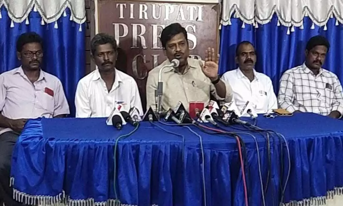 CITU district general secretary K Murali speaking to media on TTD forest workers service regularisation, in Tirupati on Thursday