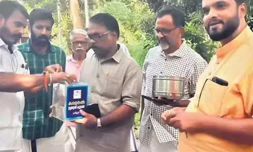 Volunteers of Karuthal Koottayma collecting money through a challenge to construct a house for a beneficiary in Karthikapally