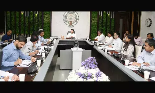 Chief Minister Y S Jagan Mohan Reddy conducts a review on school education at his camp office in Tadepalli on Thursday