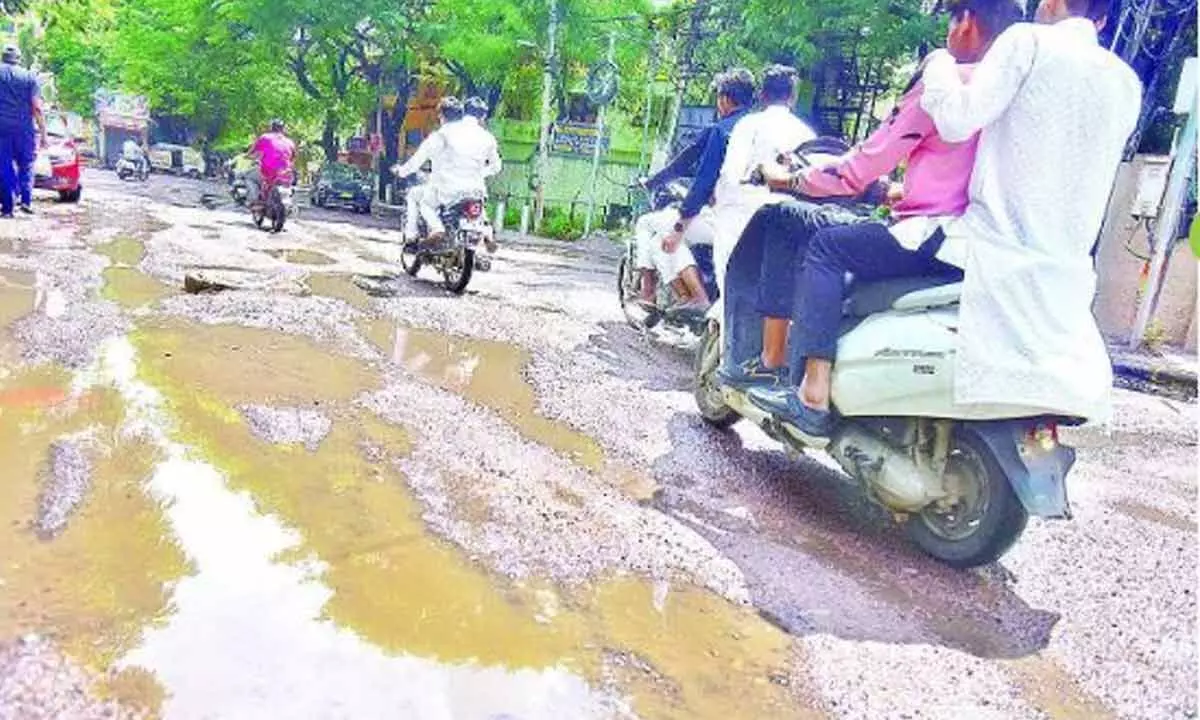 GHMC fills potholes in Shalivahana Nagar