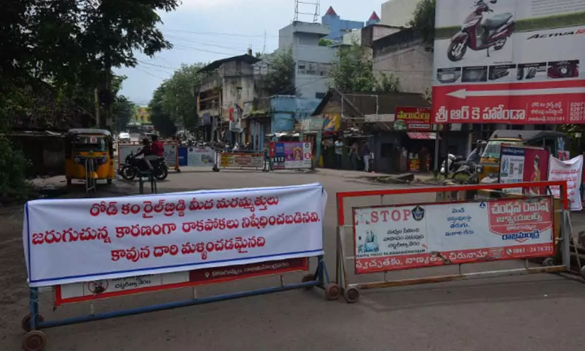The banners put in by the officials near the road-cum-rail bridge across Godavari river in Rajamahendravaram