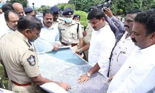 Industries Minister Gudivada Amarnath along with City Police Commissioner Ch Srikanth reviewing arrangements for Visakha Garjana, in Visakhapatnam on Friday