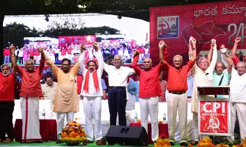 CPI General Secretary D Raja, national secretary K Narayana, State secretary K Ramakrishna and other leaders at a public meeting in Vijayawada on Friday
