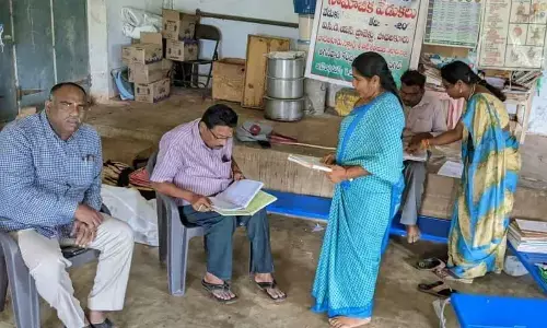Vigilance and Enforcement officials inspecting the registers at an Anganwadi centre in NTR district on Friday