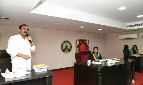 MLA Bhumana Karunakar Reddy addressing the Municipal Corporation Council meeting in Tirupati on Friday. Mayor Dr R Sirisha and Municipal Commissioner Anupama Anjali are also seen