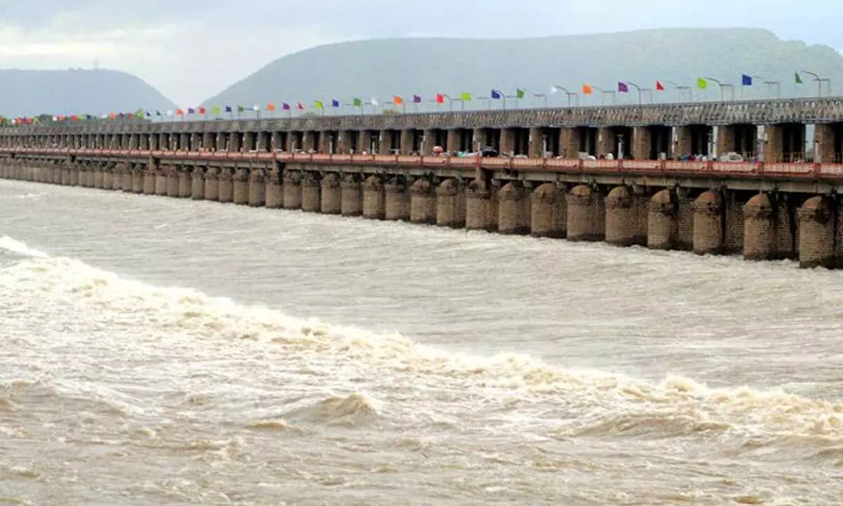 Flood water released from Prakasam barrage  in Vijayawada on Sunday  	Photo: Ch Venkata Mastan