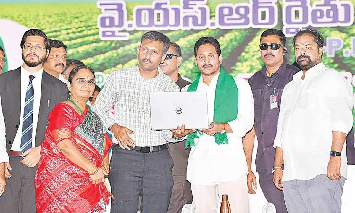 Chief Minister Y S Jagan Mohan Reddy releasing the second tranche of financial assistance to farmers in Allagadda on Monday