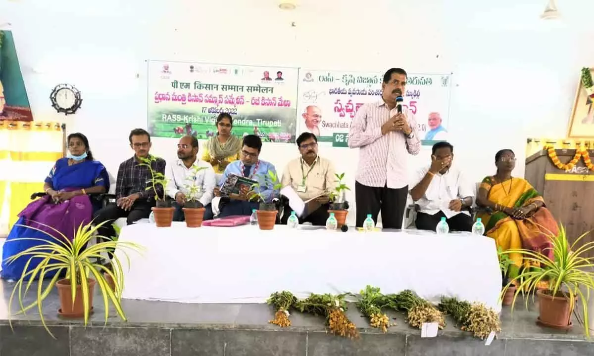 Department of Agricultural Engineering Principal Scientist C Ramana speaking at the Kisan Mela conducted by RASS-KVK, in Tirupati on Monday