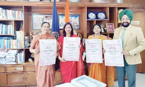 SPMVV V-C Prof  D Jamuna, Registrar Prof D M Mamatha, Pankaj Mittal and Baljit Singh Sekhon of AIU releasing poster of ‘Padma Tarang’ in Tirupati on Monday