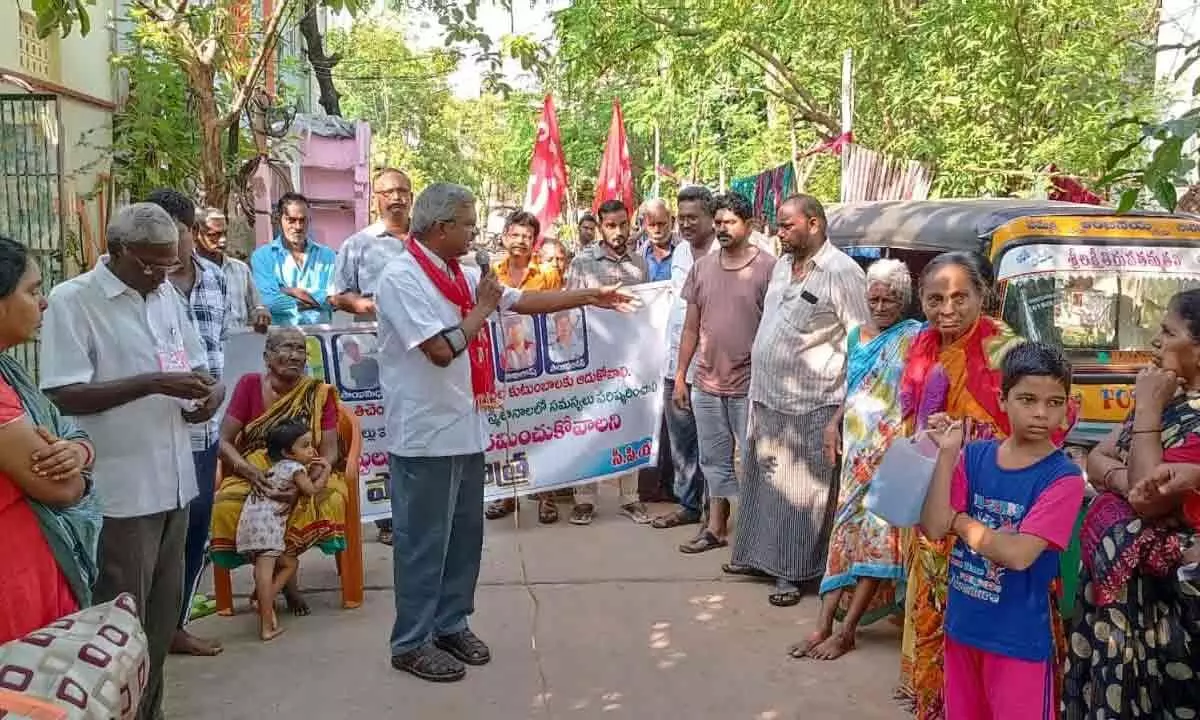 CPM leaders taking out a rally in 61st division in Payakapuram in Vijayawada on Tuesday