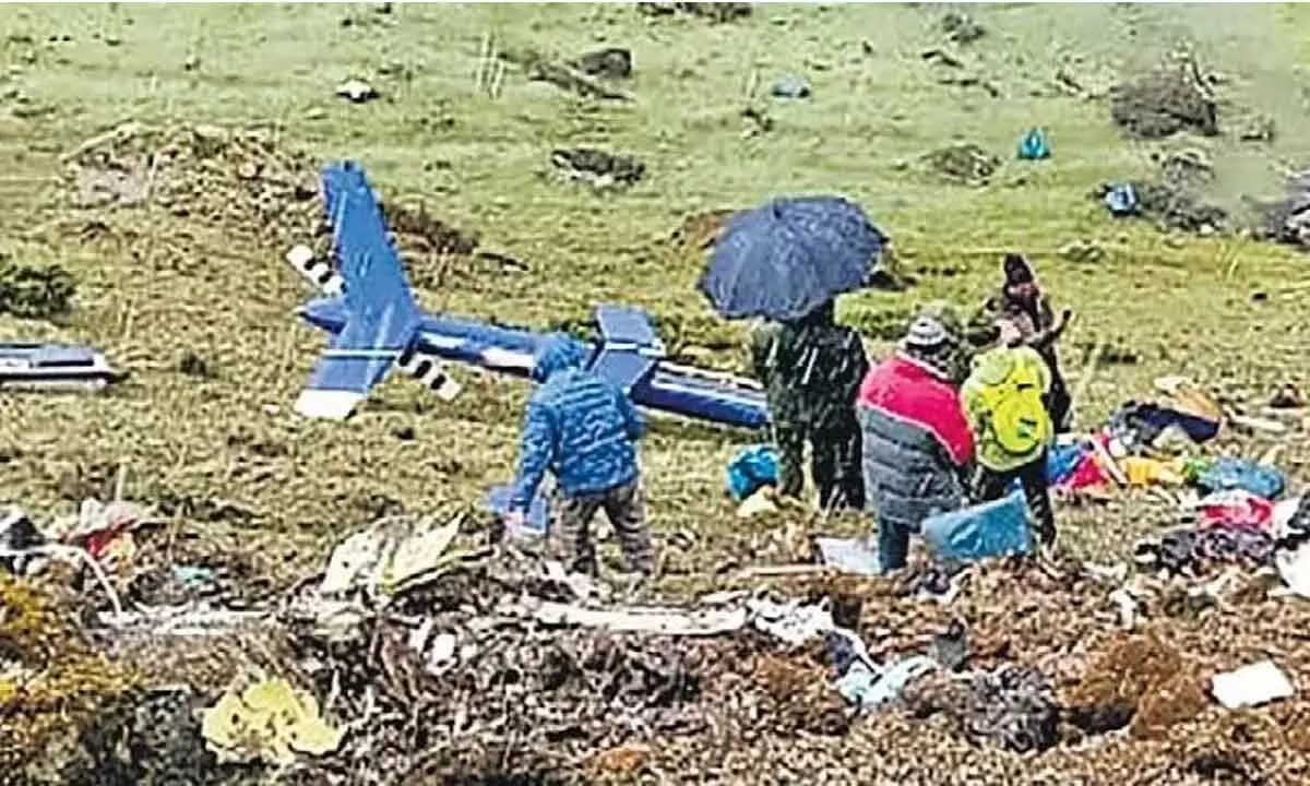 Locals at the site after a helicopter carrying pilgrims crashed near Kedarnath in Uttarakhand on Tuesday