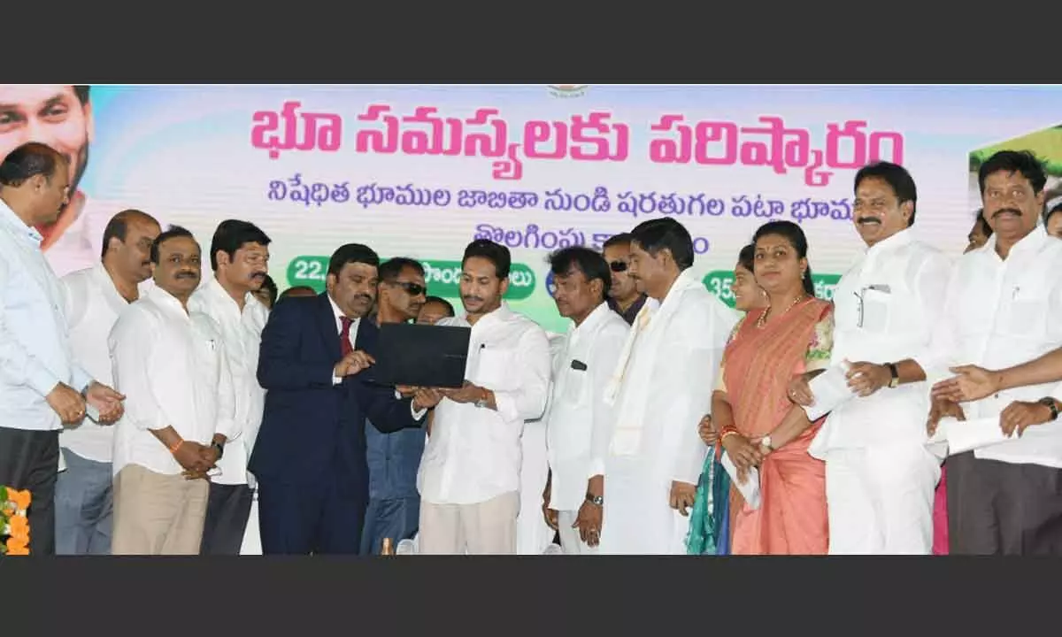 Chief Minister Y S Jagan Mohan Reddy launches denotification of Section 22A lands at a programme at Avanigadda  in Krishna district on Thursday