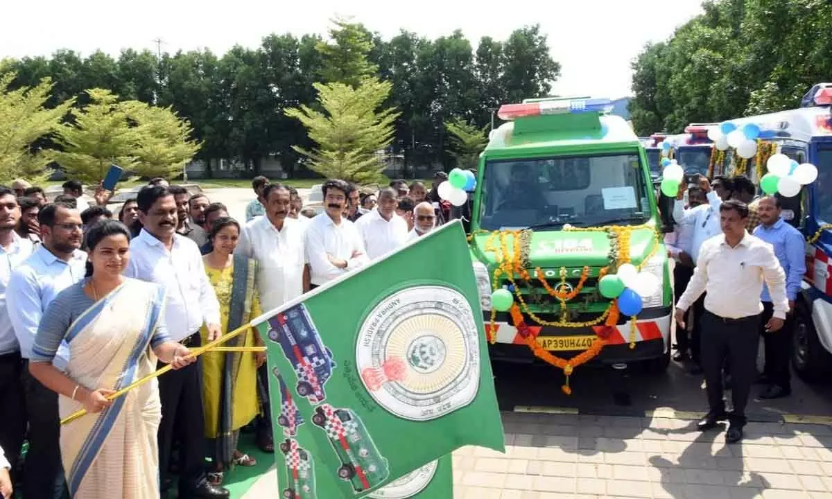 Medical and health minister Vidadala Rajini flags off 40 new ambulances for tribal areas, in Mangalagiri on Thursday