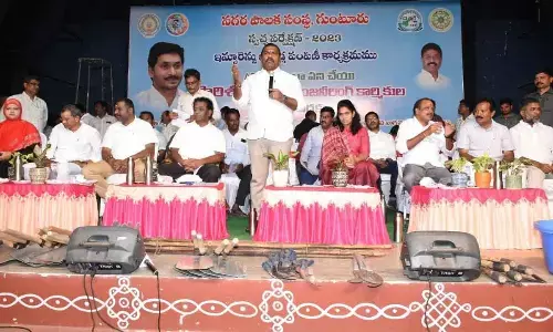 Mayor Kavati Siva Naga Manohar Naidu addressing a meeting in Guntur on Thursday. GMC Commissioner Kirthi Chekuri, MLCs KS Lakshamana Rao and Lella Appi Reddy, MLAs Mustafa and Maddaligiridhara Rao are also seen.