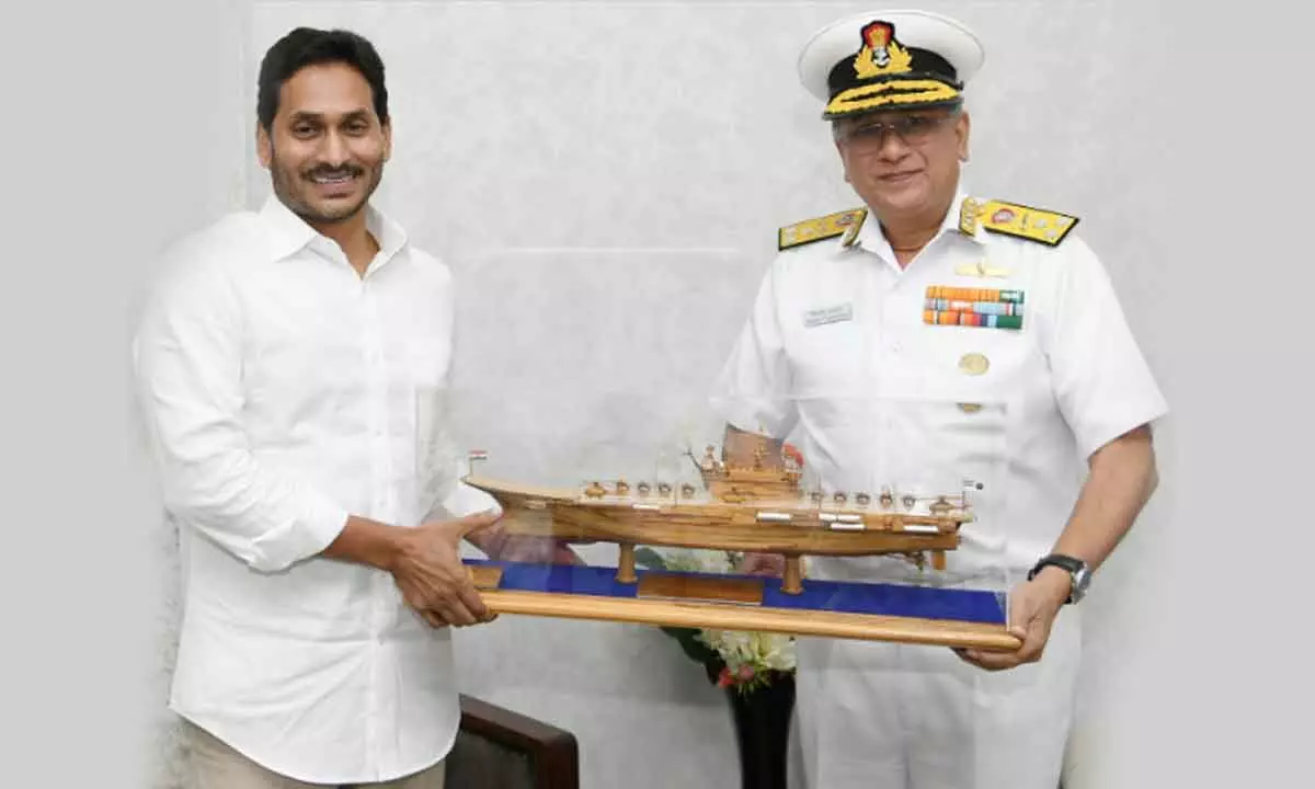 Eastern Naval Command Flag Officer Commanding-in-Chief  Vice Admiral Biswajit Dasgupta presents a replica INS Vinkrant to Chief Minister Y S Jagan Mohan Reddy at his camp office in Tadepalli on Friday