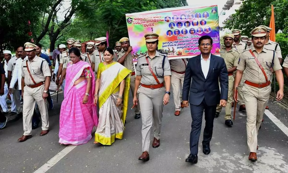 Prakasam District Collector AS Dinesh Kumar, SP Malika Garg and others participating in a rally in Ongole on Friday