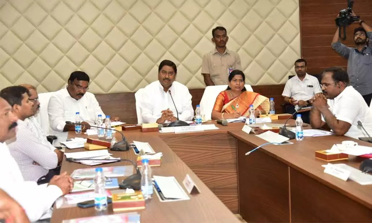 Revenue minister Dharmana Prasada Rao chairs the meeting of committee on assigned lands at Mangalagiri on Friday