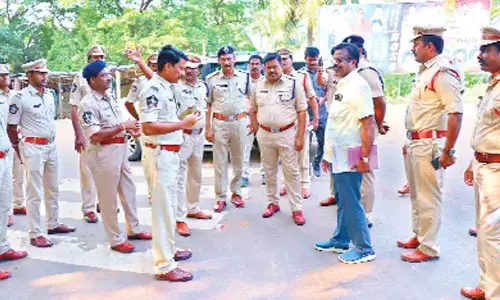 District SP M Ravindranath Babu inspecting Nadakuduru village on Friday, ahead of Amaravati farmers’ padayatra