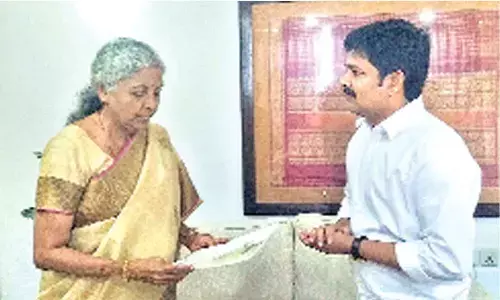 Tirupati MP Dr M Gurumoorthy submitting a representation to Union Finance Minister Nirmala Sitharaman in Tirumala on Friday