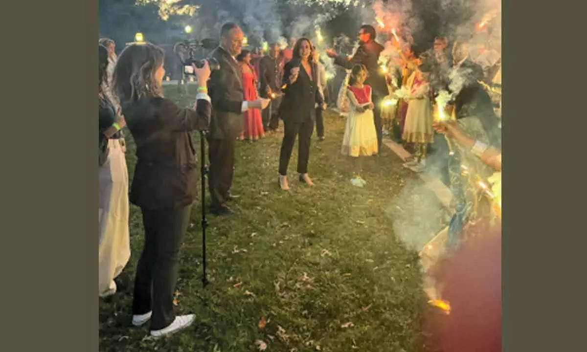 United States Vice-President Kamala Harris with Indian Americans celebrates the Diwali festival with sparklers during an event at her official residence, in Washington on Saturday