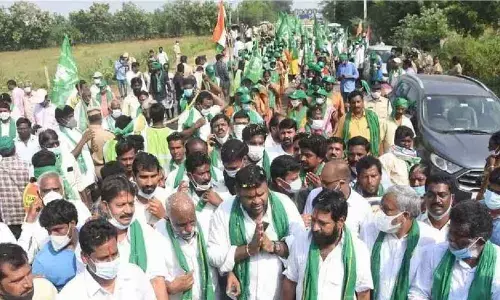 Amaravati farmers pause walkathon