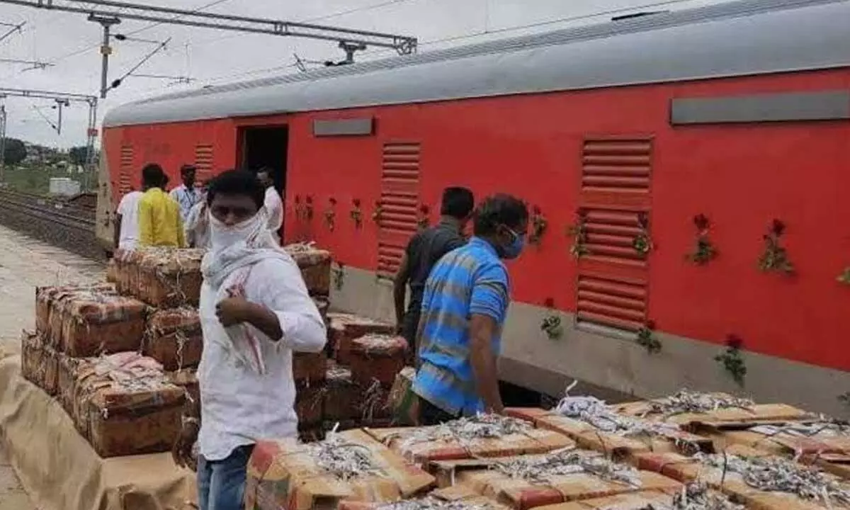 Packed farm produce brought to railway station at Tadipatri