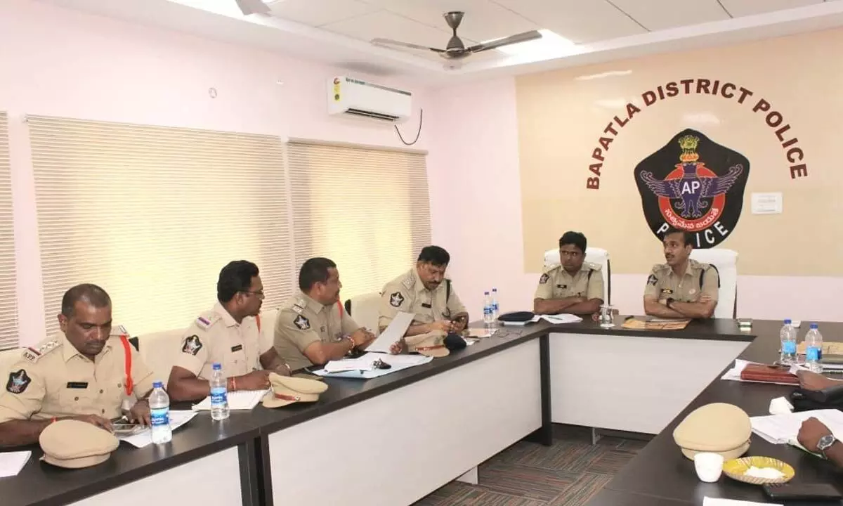 District SP Vakul Jindal addressing the police officials at a meeting at DPO in Bapatla on Tuesday